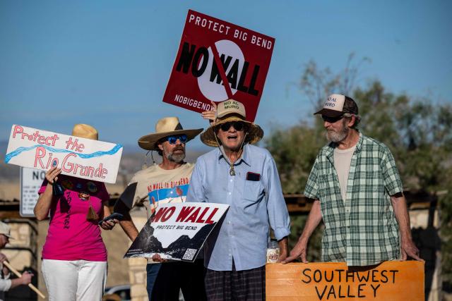 People protest the plans by US President Donald Trump's administration to build a section of the border wall at the Big Bend National Park in Study Butte, Texas, on August 15, 2026. (Photo by RONALDO SCHEMIDT / AFP)