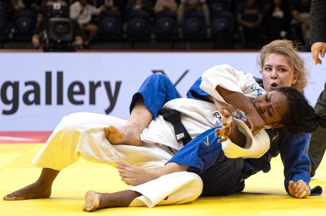 Brazil's Nauana Silva (white) competes for gold against Germany's Dena Pohl in the women's -70kg category final event, during the International Judo Federation (IJF) Lima Grand Prix 2026, in Lima, on August 15, 2026. (Photo by ERNESTO BENAVIDES / AFP)