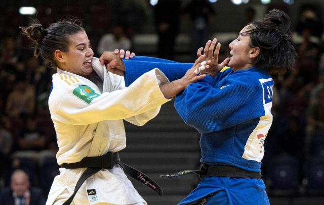 Japan's Seiko Watanabe (blue) competes for gold against Spain's Laura Vazquez in the women's -63kg category final event, during the International Judo Federation (IJF) Lima Grand Prix 2026, in Lima, on August 15, 2026. (Photo by ERNESTO BENAVIDES / AFP)