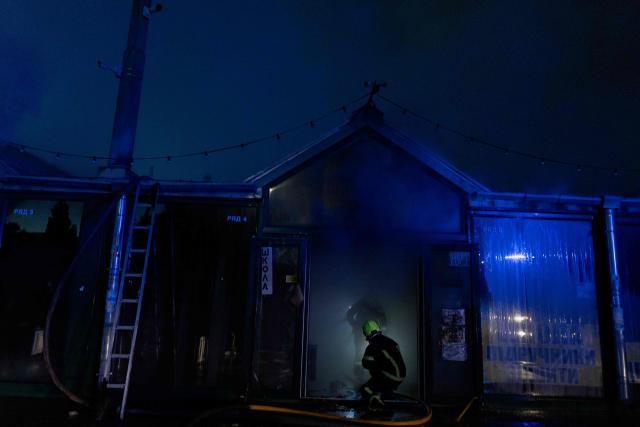 Ukrainian rescuers work at the site of a Russian strike in Kyiv on August 16, 2026, amid the Russian invasion of Ukraine. Russian strikes killed one person and wounded at least seven others in Ukraine, authorities said August 16, while Moscow officials reported downing more than 100 drones heading towards the capital. (Photo by Tetiana DZHAFAROVA / AFP)