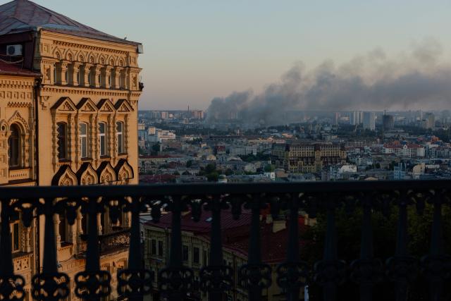 Smoke rises over the city following a Russian strike in Kyiv on August 16, 2026, amid the Russian invasion of Ukraine. Russian strikes killed one person and wounded at least seven others in Ukraine, authorities said August 16, while Moscow officials reported downing more than 100 drones heading towards the capital. (Photo by Tetiana DZHAFAROVA / AFP)