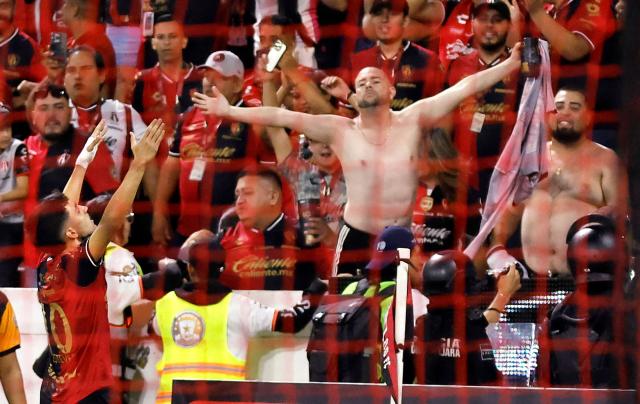 Atlas' Portuguese midfielder #10 Luis Esteves celebrates after scoring his team's second goal during the Liga MX Apertura tournament football match between Atlas and Tigres at Jalisco stadium in Guadalajara, state of Jalisco, Mexico on August 15, 2026. (Photo by ULISES RUIZ / AFP)