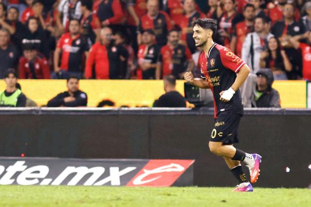 Atlas' Portuguese midfielder #10 Luis Esteves celebrates after scoring his team's second goal during the Liga MX Apertura tournament football match between Atlas and Tigres at Jalisco stadium in Guadalajara, state of Jalisco, Mexico on August 15, 2026. (Photo by ULISES RUIZ / AFP)
