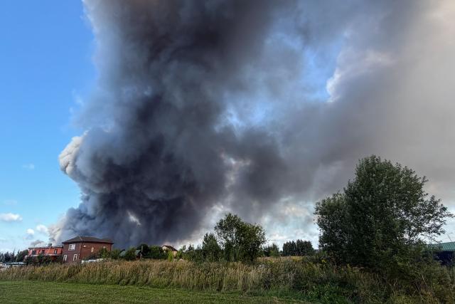Smoke rises during a fire at Russian e-commerce firm Wildberries' logistics complex near the town of Podolsk, outside Moscow on August 16, 2026. (Photo by TATYANA MAKEYEVA / AFP)