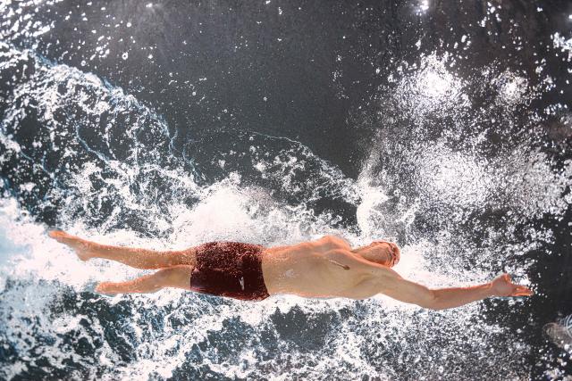 France's swimmer Leon Marchand competes in a heat for the men's 400m freestyle swimming event during the LEN European Aquatics Championships at the Olympic Aquatic Centre in Saint-Denis, northern suburbs of Paris, on August 16, 2026. (Photo by Sébastien BOZON / AFP)