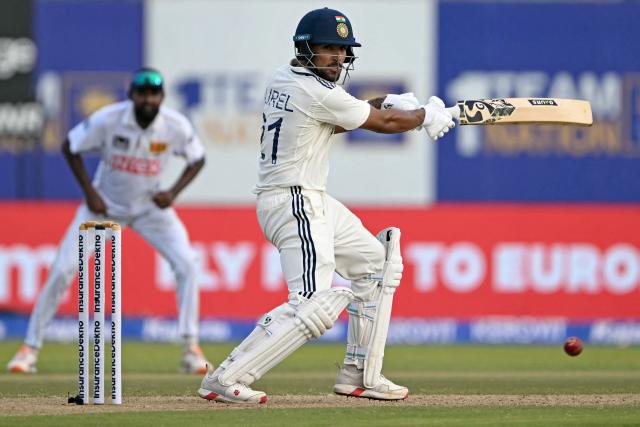 India's Dhruv Jurel watches the ball after playing a shot during the second day of the first Test cricket match between Sri Lanka and India at the Galle International Stadium in Galle on August 16, 2026. (Photo by Ishara S. KODIKARA / AFP)