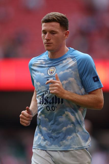 Manchester City's English midfielder #05 Elliot Anderson warms up ahead of the English FA Community Shield football match between Arsenal and Manchester City at The Principality Stadium, in Cardiff, south Wales on August 16, 2026. (Photo by Adrian Dennis / AFP)