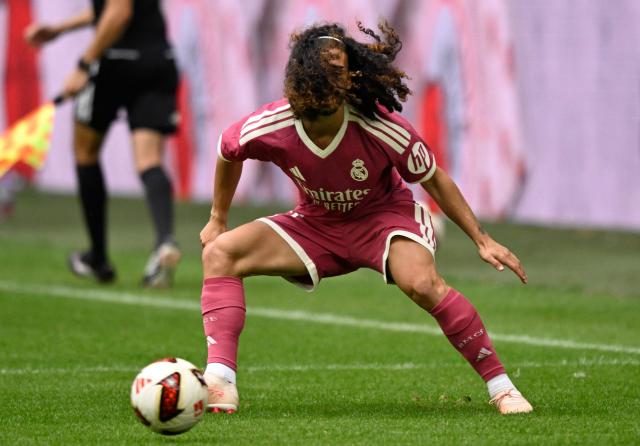 Real Madrid's Spanish defender #17 Marc Cucurella plays the ball during the pre-season friendly football match between FC Schalke 04 and Real Madrid in Gelsenkirchen, western Germany, on August 16, 2026. (Photo by INA FASSBENDER / AFP)