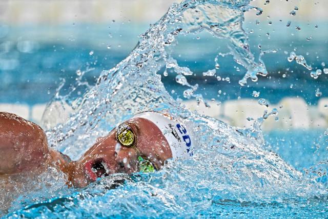 France's Leon Marchand competes in the final of the men's 400m freestyle swimming event during the LEN European Aquatics Championships at the Olympic Aquatic Centre in Saint-Denis, northern suburbs of Paris, on August 16, 2026. (Photo by JULIEN DE ROSA / AFP)