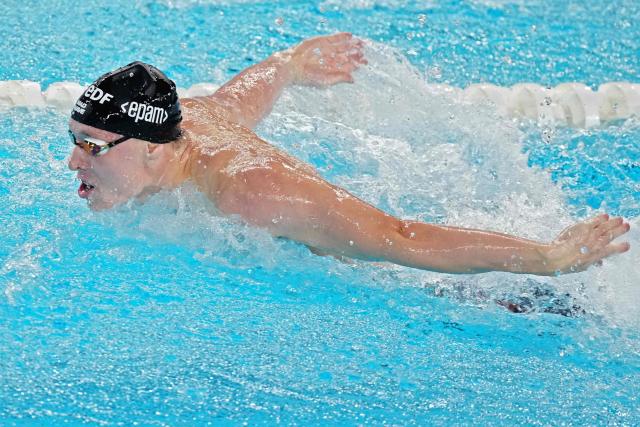Neutral athlete B Andrei Minakov competes in the final of the men's 4x100m medley relay swimming event during the LEN European Aquatics Championships at the Olympic Aquatic Centre in Saint-Denis, northern suburbs of Paris, on August 16, 2026. (Photo by SEBASTIEN BOZON / AFP)