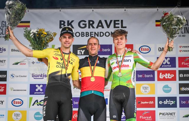 (From L) Second-placed Belgian Wout van Aert, winner Belgian Daan Soete and third-placed Belgian Witse Meeussen celebrate on the podium after the men's elite race at the Belgian Gravel Championships in Grobbendonk on August 16, 2026. (Photo by ELIAS ROM / Belga / AFP) / Belgium OUT