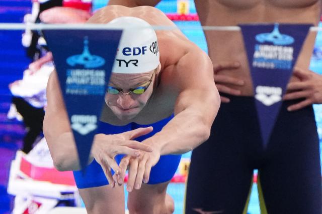 France's Leon Marchand  competes in  the final of the men's 4x100m medley relay swimming event during the LEN European Aquatics Championships at the Olympic Aquatic Centre in Saint-Denis, northern suburbs of Paris, on August 16, 2026. (Photo by Dimitar DILKOFF / AFP)