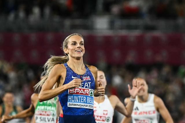 Britain's Georgia Hunter Bell celebrates as she crosses the finish line to win the women's 1500m final during the European Athletics Championships at Alexander Stadium in Birmingham on August 16, 2026. (Photo by Paul ELLIS / AFP)