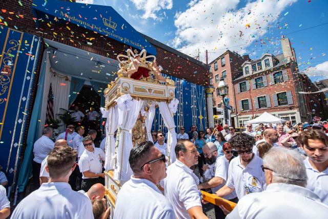 Members of the Maritime Society of the Madonna Del Soccorso Di Sciacca carry the statue of the Madonna del Soccorso di Sciacca as they begin a nine hour procession during the 116th Fisherman’s Feast Italian festival in Boston, Massachusetts on August 16, 2026. (Photo by JOSEPH PREZIOSO / AFP)