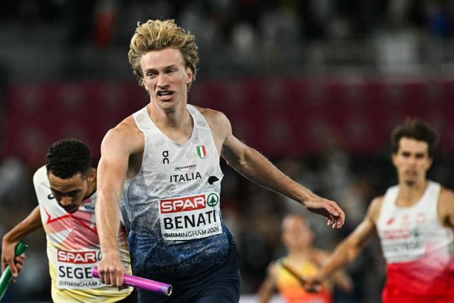 Italy's Lorenzo Benati celebrates as he crosses the finish line to win the men's 4 x 400m relay final during the European Athletics Championships at Alexander Stadium in Birmingham on August 16, 2026. (Photo by Paul ELLIS / AFP)