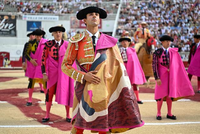 French matador Carlos Olsina takes part in the paseo (parade) ahead of his bullfight during the Feria in Beziers, southern France, on August 16, 2026. (Photo by Gabriel BOUYS / AFP)
