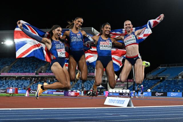 Silver medallists (from L) Britain's Yemi Mary John, Great Britain Lina Nielsen, Britain's Nicole Yeargin and Britain's Emily Newnham celebrate after competing in the women's 4 x 400m relay final during the European Athletics Championships at Alexander Stadium in Birmingham on August 16, 2026. (Photo by Paul ELLIS / AFP)