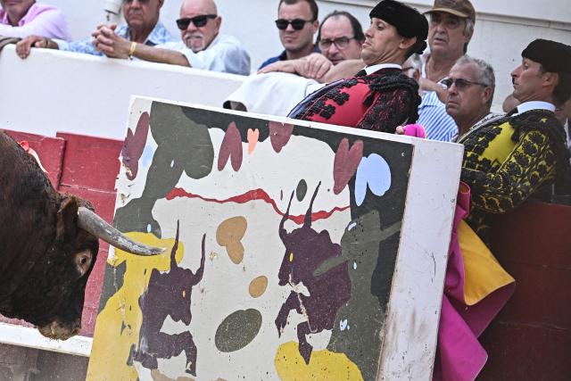 This photograph shows French artist Quentin Revilla's painting during a bullfight as part of the Feria in Beziers, southern France, on August 16, 2026. (Photo by Gabriel BOUYS / AFP)