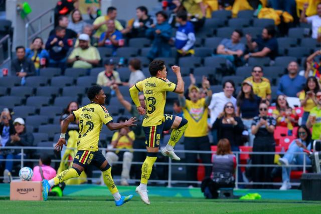 America's Brazilian midfielder #23 Raphael Veiga celebrates scoring his team's first goal during the Liga MX Apertura tournament football match between America and San Luis at the Banorte stadium in Mexico City, on August 16, 2026. (Photo by AFP)