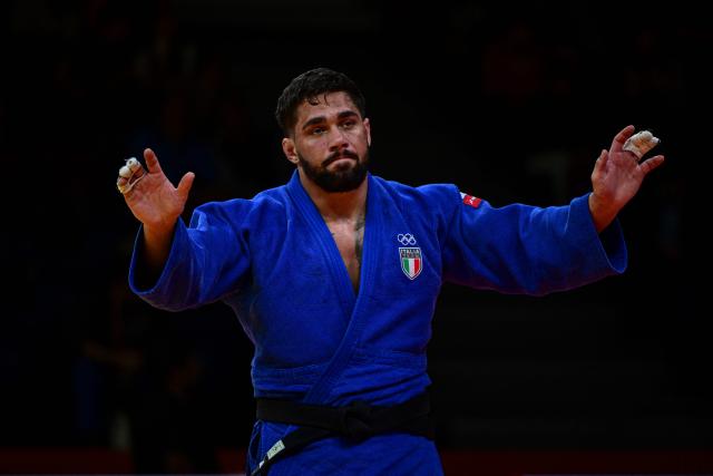 Italy's Gennaro Pirelli reacts as he competes for gold against compatriot Daniele Accogli in the men's -100kg category final event, during the International Judo Federation (IJF) Lima Grand Prix 2026, in Lima, on August 16, 2026. (Photo by Ernesto BENAVIDES / AFP)