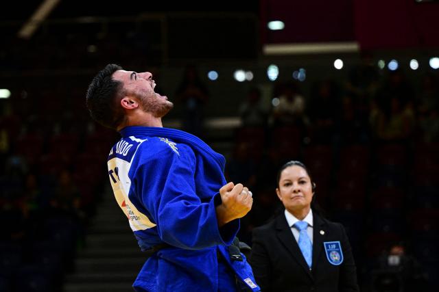 Cyprus' Giannis Antoniou reacts as he competes for gold against Croatia's Mikita Sviryd in the men's +100kg category final event, during the International Judo Federation (IJF) Lima Grand Prix 2026, in Lima, on August 16, 2026. (Photo by Ernesto BENAVIDES / AFP)