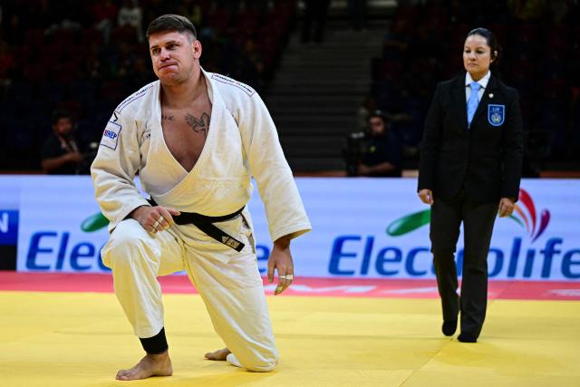 Croatia's Mikita Sviryd reacts as he competes for gold against Cyprus' Giannis Antoniou in the men's +100kg category final event, during the International Judo Federation (IJF) Lima Grand Prix 2026, in Lima, on August 16, 2026. (Photo by Ernesto BENAVIDES / AFP)