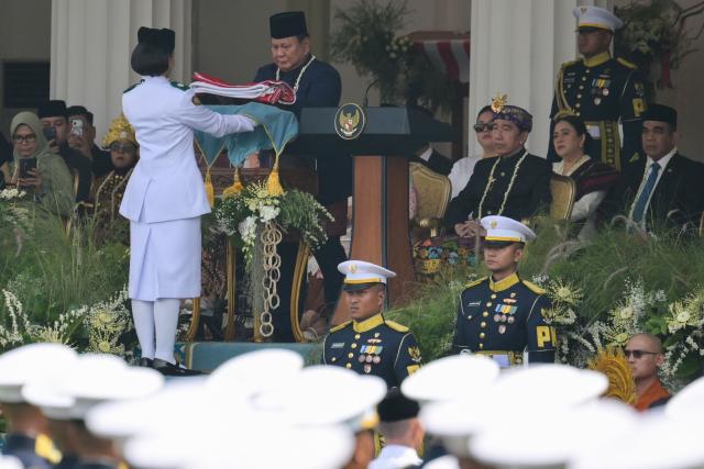 Indonesia's President Prabowo Subianto takes part in a flag raising ceremony marking Indonesia's 81st Independence Day at Merdeka Palace in Jakarta on August 17, 2026. (Photo by BAY ISMOYO / AFP)