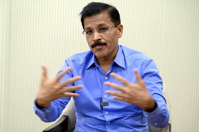 This photograph taken on July 30, 2026 shows Maharashtra's Commissioner of the Food and Drug Administration (FDA), Tukaram Mundhe speaking with AFP at his office in Mumbai. When food safety inspectors raided a Mumbai dessert parlour famed for its ice cream sandwiches last month, they found rats, houseflies and expired flavouring agents. At another beloved restaurant known for slow-cooked mutton and beef stews, they discovered meat stored in filthy containers, greasy floors and open windows that could let in insects and crows. Both eateries were ordered shut in the toughest crackdown in years on restaurants in the megacity of more than 20 million people. The sweep has targeted everything from top eateries and luxury hotels to canteens at elite institutions, including the nearly century-old Cricket Club of India. (Photo by Indranil MUKHERJEE / AFP)