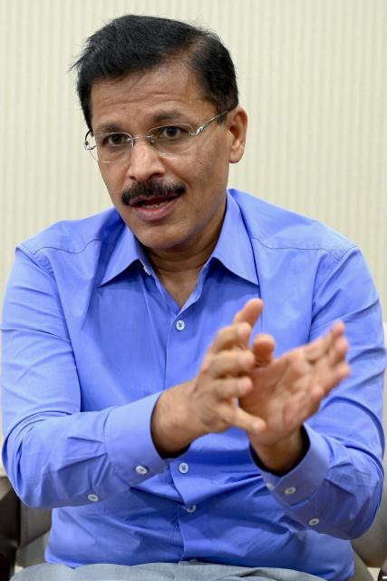 This photograph taken on July 30, 2026 shows Maharashtra's Commissioner of the Food and Drug Administration (FDA), Tukaram Mundhe speaking with AFP at his office in Mumbai. When food safety inspectors raided a Mumbai dessert parlour famed for its ice cream sandwiches last month, they found rats, houseflies and expired flavouring agents. At another beloved restaurant known for slow-cooked mutton and beef stews, they discovered meat stored in filthy containers, greasy floors and open windows that could let in insects and crows. Both eateries were ordered shut in the toughest crackdown in years on restaurants in the megacity of more than 20 million people. The sweep has targeted everything from top eateries and luxury hotels to canteens at elite institutions, including the nearly century-old Cricket Club of India. (Photo by Indranil MUKHERJEE / AFP)