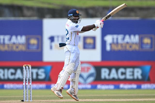 Sri Lanka's Lahiru Igalagamage plays a shot during the third day of the first Test cricket match between Sri Lanka and India at the Galle International Stadium in Galle on August 17, 2026. (Photo by Ishara S. KODIKARA / AFP)