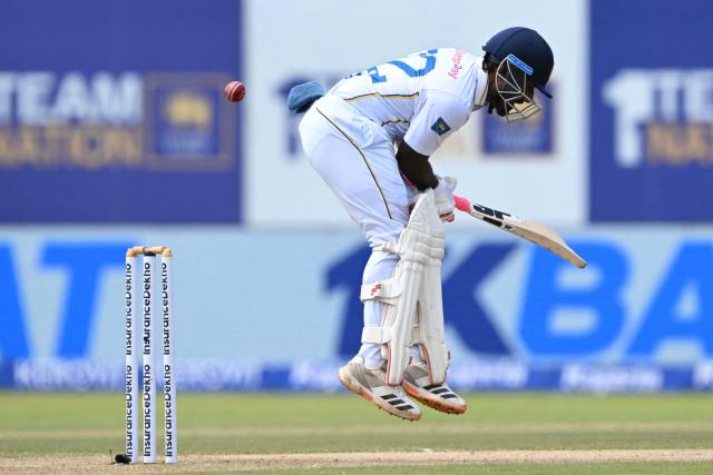 Sri Lanka's Lahiru Igalagamage plays a shot during the third day of the first Test cricket match between Sri Lanka and India at the Galle International Stadium in Galle on August 17, 2026. (Photo by Ishara S. KODIKARA / AFP)