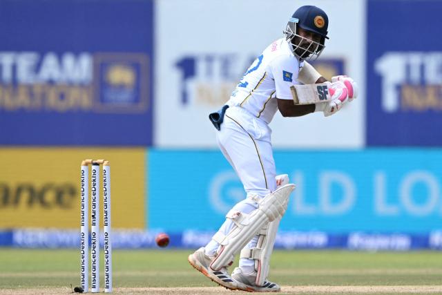 Sri Lanka's Lahiru Igalagamage plays a shot during the third day of the first Test cricket match between Sri Lanka and India at the Galle International Stadium in Galle on August 17, 2026. (Photo by Ishara S. KODIKARA / AFP)