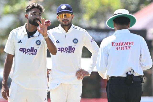 India's Mohammed Siraj (L) and captain Shubman Gill (C) gesture during the third day of the first Test cricket match between Sri Lanka and India at the Galle International Stadium in Galle on August 17, 2026. (Photo by Ishara S. KODIKARA / AFP)