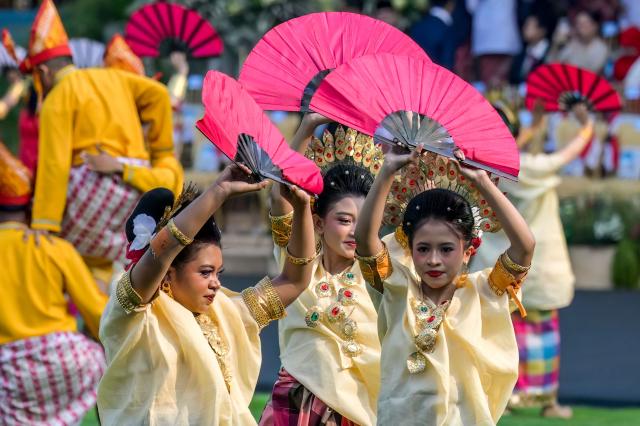 Dancers perform during a flag raising ceremony marking Indonesia's 81st Independence Day at Merdeka Palace in Jakarta on August 17, 2026. (Photo by BAY ISMOYO / AFP)