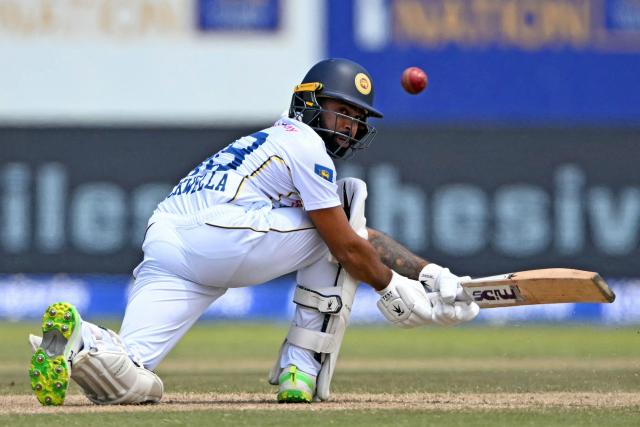 Sri Lanka's Niroshan Dickwella plays a shot during the third day of the first Test cricket match between Sri Lanka and India at the Galle International Stadium in Galle on August 17, 2026. (Photo by Ishara S. KODIKARA / AFP)