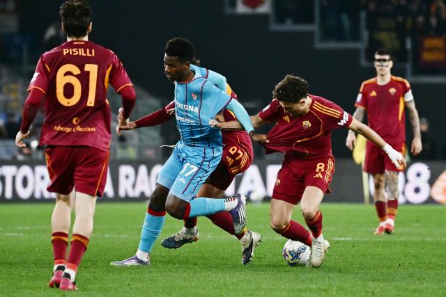(FILES) Roma's French midfielder #08 Neil El Aynaoui (R) and Cagliari's French forward #37 Yael Fritz Junior Trepy fight for the ball during the Italian Serie A football match between AS Roma and Cagliari at the Olympic Stadium in Rome on Febuary 9, 2026. French footballer Yael Trepy, who plays for Serie A club Cagliari, is in intensive care, the Italian club confirmed on August 17, 2026, with media reporting the 20-year-old nearly drowned in a swimming pool. (Photo by Filippo MONTEFORTE / AFP)