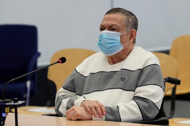(FILES) Former Salvadoran colonel and Defense Deputy Minister Inocente Montano looks on before the start of a trial for his alleged participation in the murder of six Spanish Jesuit priests and two collaborators in 1989, in Madrid on June 08, 2020. A Spanish court granted early parole to former Salvadoran colonel Inocente Montano, sentenced to 113 years in prison for the murder of five Spanish Jesuits during the civil war in the Central American country, due to an irreversible illness he suffers at age 84, AFP reports on August 17, 2026. (Photo by Kiko HUESCA / POOL / AFP)
