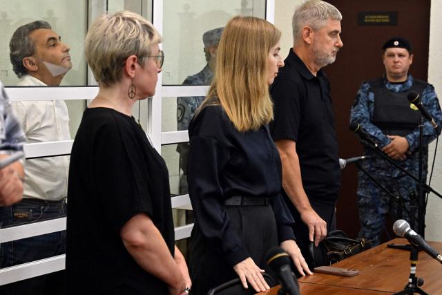 Russian opposition politician Lev Shlosberg (L) attends a city court session in Pskov, northwestern Russia on August 17, 2026, before being sentenced to 11 years in prison over his criticism of Moscow's offensive in Ukraine. The veteran Yabloko party member was found guilty of "public actions aimed at discrediting the use of the Armed Forces of the Russian Federation". (Photo by Olga MALTSEVA / AFP)
