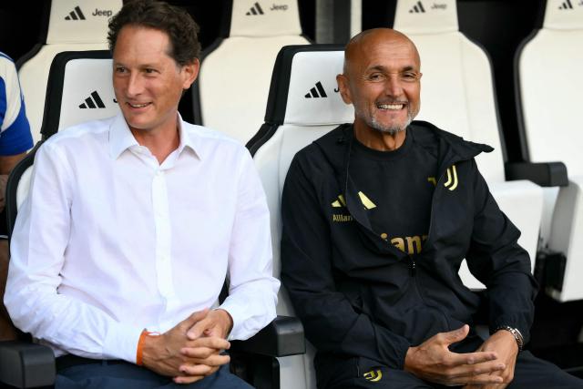 Stellantis' Chairman and Exor CEO, representative of Juventus’s controlling ownership, John Elkann (L) sits on the bench with Juventus' Italian coach Luciano Spalletti prior to the friendly football match between Juventus and Juventus Next Gen in the Allianz Stadium in Turin, on August 17, 2026. (Photo by Marco Bertorello / AFP)