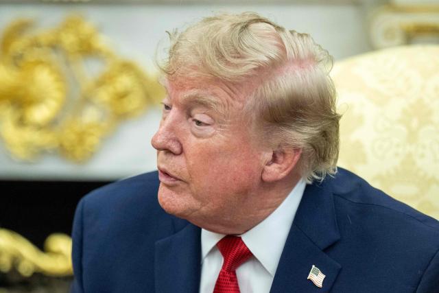 US President Donald Trump speaks as he meets with lifeguard Ryder Williams in the Oval Office of the White House in Washington, DC, on August 17, 2026. The 16-year-old Williams rescued 10-year-old Nathaniel Rai in rough surf at Seabright Beach last month in Santa Cruz, California. (Photo by Jim WATSON / AFP)