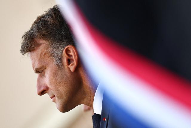 French President Emmanuel Macron attends a ceremony commemorating the 82nd anniversary of the Allied 'Operation Dragoon' landings in Provence and the liberation of the village of Bormes-les-Mimosas during World War II, in Bormes-les-Mimosas, southeastern France, on August 17, 2026. (Photo by Manon Cruz / POOL / AFP)