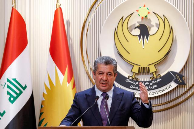 (FILES) Masrour Barzani, Prime Minister of the Iraqi Kurdistan Regional Government, gives a press conference in the autonomous region's capital Arbil on June 25, 2025. Iraq's Prime Minister has ordered a probe into the drone attack that targeted the Kurdistan's Prime Minister Masrour Barzani's office and the home of the autonomous region's intelligence chief overnight, his office said on August 16, 2026. (Photo by Safin HAMID / AFP)
