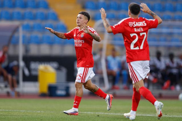 Benfica's Argentine forward #25 Gianluca Prestianni (L) celebrates scoring their first goal during the Portuguese League football match between Casa Pia AC and SL Benfica at the Municpal Stadium in Rio Maior, north of Lisbon on August 17, 2026. (Photo by FILIPE AMORIM / AFP)