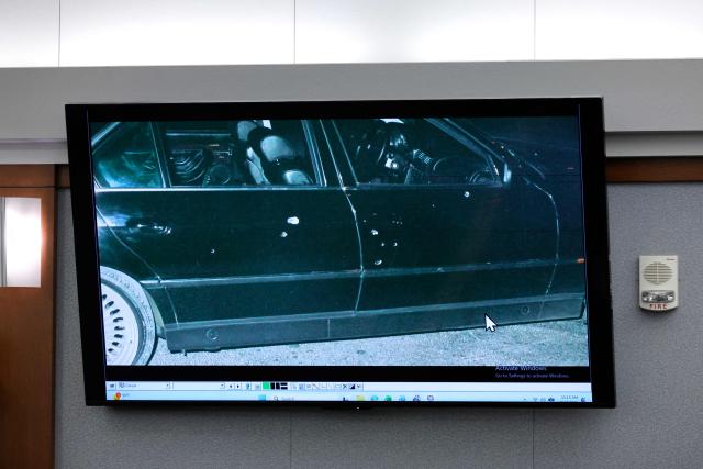 A 1996 photo of the car that rapper Tupac Shukur was riding in when he was shot is displayed during the Duane Davis murder trial, related to the 1996 killing of the rapper, at Clark County District Court at the Regional Justice Center in Las Vegas, Nevada, on August 17, 2026. The trial of the former gang leader accused of orchestrating the murder of rapper Tupac Shakur began on August 10, 30 years after one of America's most high-profile unresolved killings. The proceedings, expected to last a month, will likely not make clear who fired the shots that killed the California hip-hop legend on the night of September 7, 1996, while he was in Las Vegas to see a Mike Tyson boxing match. (Photo by STEVE MARCUS / POOL / AFP)