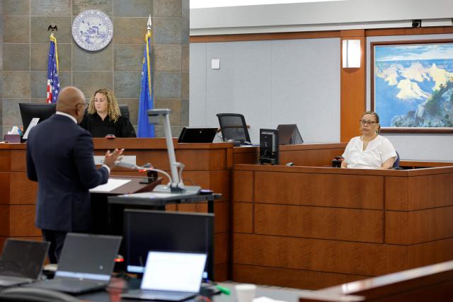 Chief Deputy District Attorney Binu Palal (L) asks a question to witness Ingrid Stokes during the Duane Davis murder trial, related to the 1996 killing of rapper Tupac Shakur, at Clark County District Court at the Regional Justice Center in Las Vegas, Nevada, on August 17, 2026. The trial of the former gang leader accused of orchestrating the murder of rapper Tupac Shakur began on August 10, 30 years after one of America's most high-profile unresolved killings. The proceedings, expected to last a month, will likely not make clear who fired the shots that killed the California hip-hop legend on the night of September 7, 1996, while he was in Las Vegas to see a Mike Tyson boxing match. (Photo by STEVE MARCUS / POOL / AFP)
