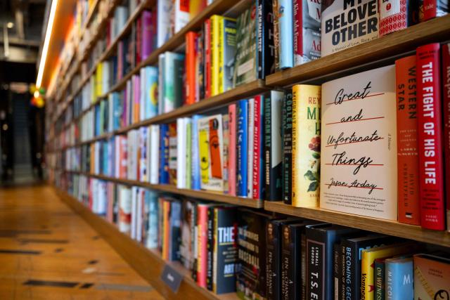 A copy of "Great and Unfortunate Things" by late British academic Jason Arday is displayed on a shelf at a bookstore in Washington, DC, on August 17, 2026. Arday, who became Cambridge's youngest ever black professor when he was appointed in 2023, was found dead on August 14 aged 41, after mounting accusations he had plagiarised parts of his doctoral thesis and exaggerated some of his personal life achievements. (Photo by Kent Nishimura / AFP)