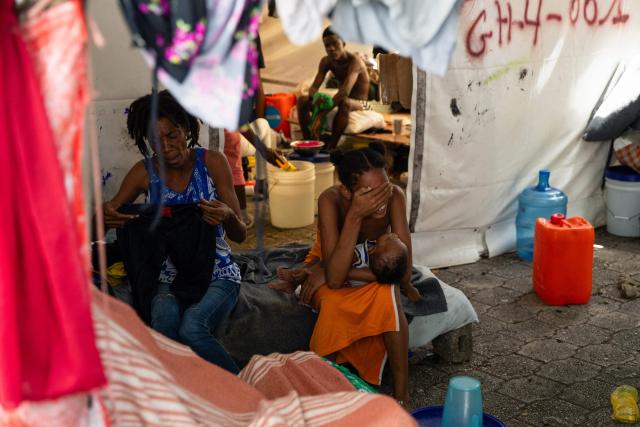People that were displaced from their homes due to gang violence are seeing at a temporary camp in Port-au-Prince, Haiti, on August 17,2026. (Photo by Clarens SIFFROY / AFP)