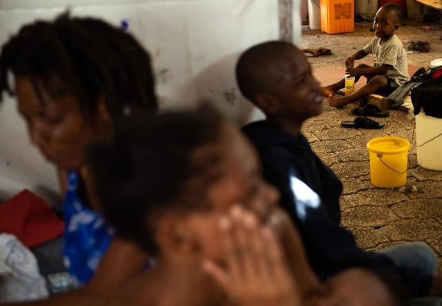 People that were displaced from their homes due to gang violence are seeing at a temporary camp in Port-au-Prince, Haiti, on August 17,2026. (Photo by Clarens SIFFROY / AFP)