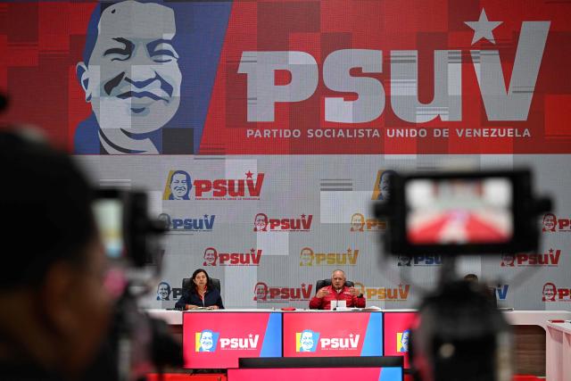 Venezuela's Minister of the Popular Power for Interior, Justice and Peace, Diosdado Cabello (R), speaks during a press conference of the United Socialist Party of Venezuela (PSUV) in Caracas on August 17, 2026. (Photo by Federico PARRA / AFP)