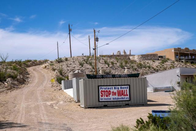 (FILES) A protest sign is seen on a state road that leads into Big Bend National Park in southern Texas, on August 15, 2026. US President Donald Trump's administration said August 17, 2026 it had paused construction on a $1.7 billion border project at Big Bend National Park in Texas that has faced fierce local opposition across party lines. (Photo by RONALDO SCHEMIDT / AFP)